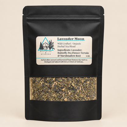 Tea package with label featuring herbal blend details against a blurred natural background