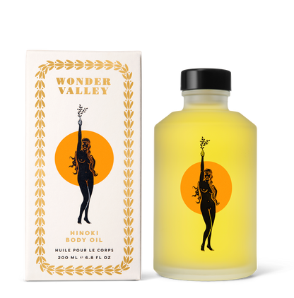 Bottle and packaging of Wonder Valley Hinoki Body Oil on a white background