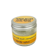 A small clear glass jar of peach detox clay mask with a silver metal lid and a yellow label, shown on a plain white background.