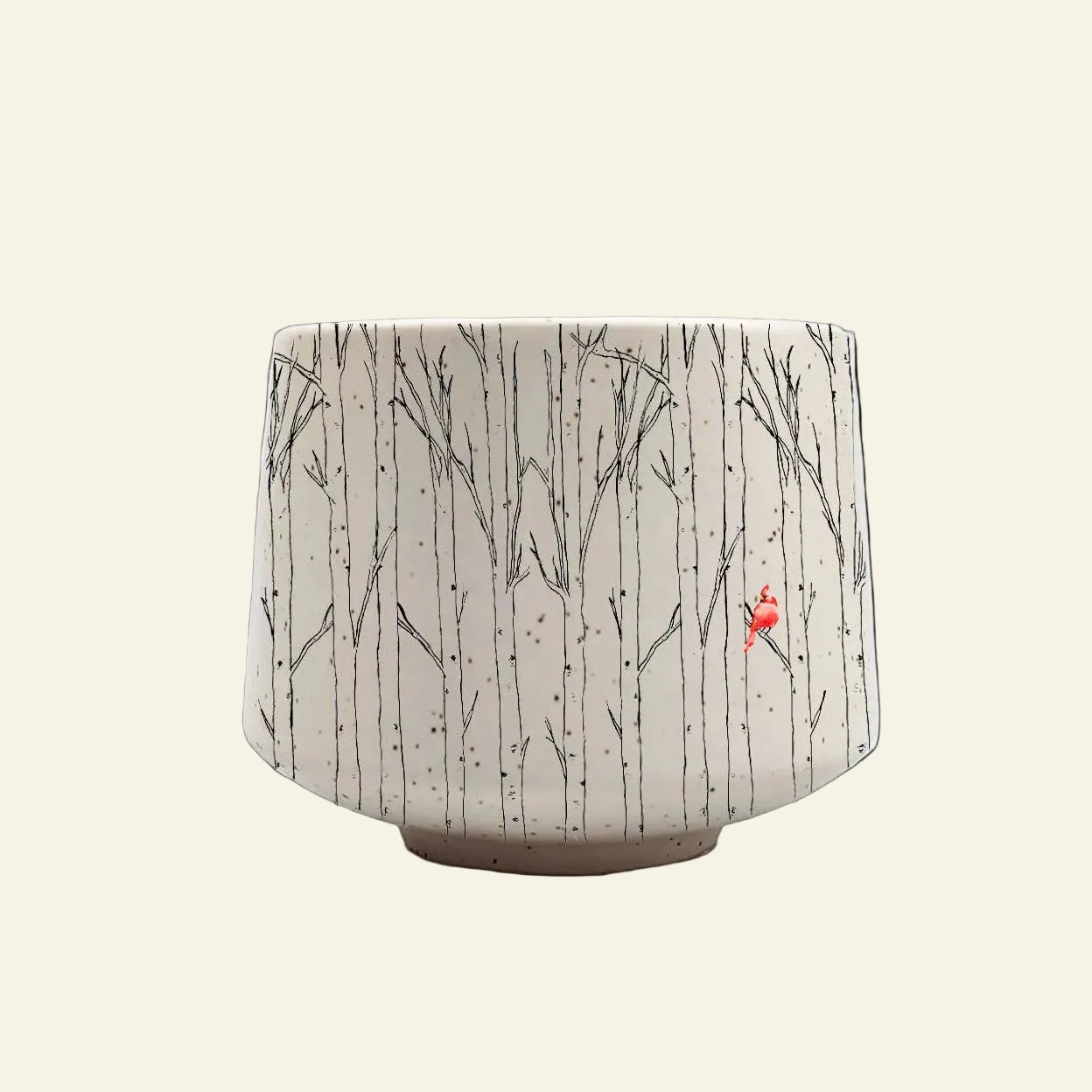 Ceramic pot with tree pattern on a white background
