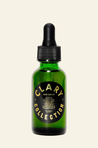 Green bottle of Clary Face Serum with dropper on a white background