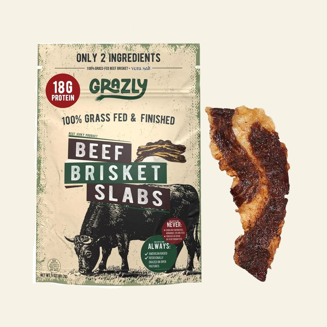 Grazly beef brisket slabs packaging with a piece of beef brisket on a white background
