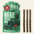 A package of Grazy Beef Meat Sticks shown with five individual stick packets fanned behind the main bag and four long brown meat sticks displayed to the right on a white background.