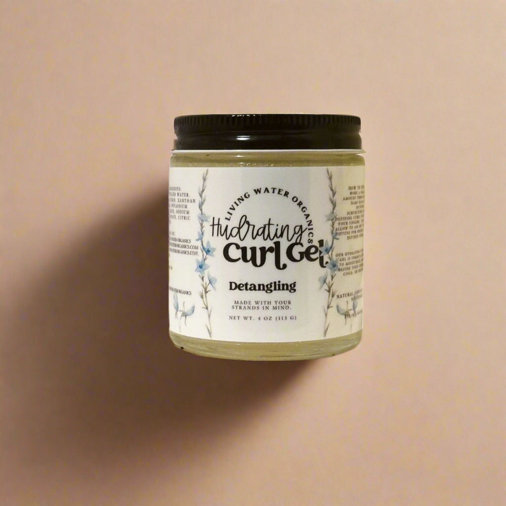 Jar of hydrating curl gel with a label on a beige background