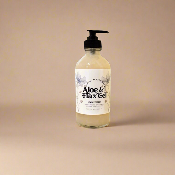Bottle of Aloe & Flaxgel on a beige background