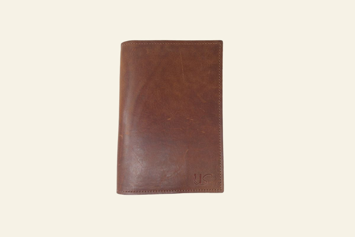 Brown leather wallet on a white background