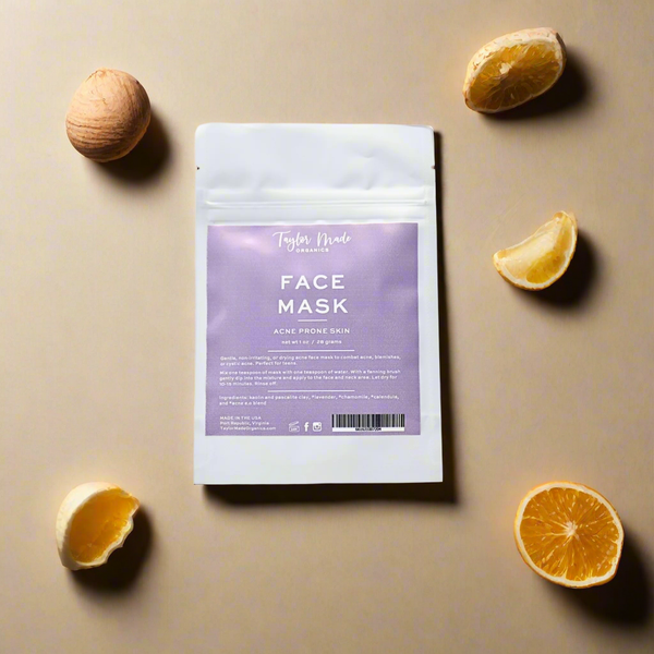 Face mask packaging with a purple label on a beige background