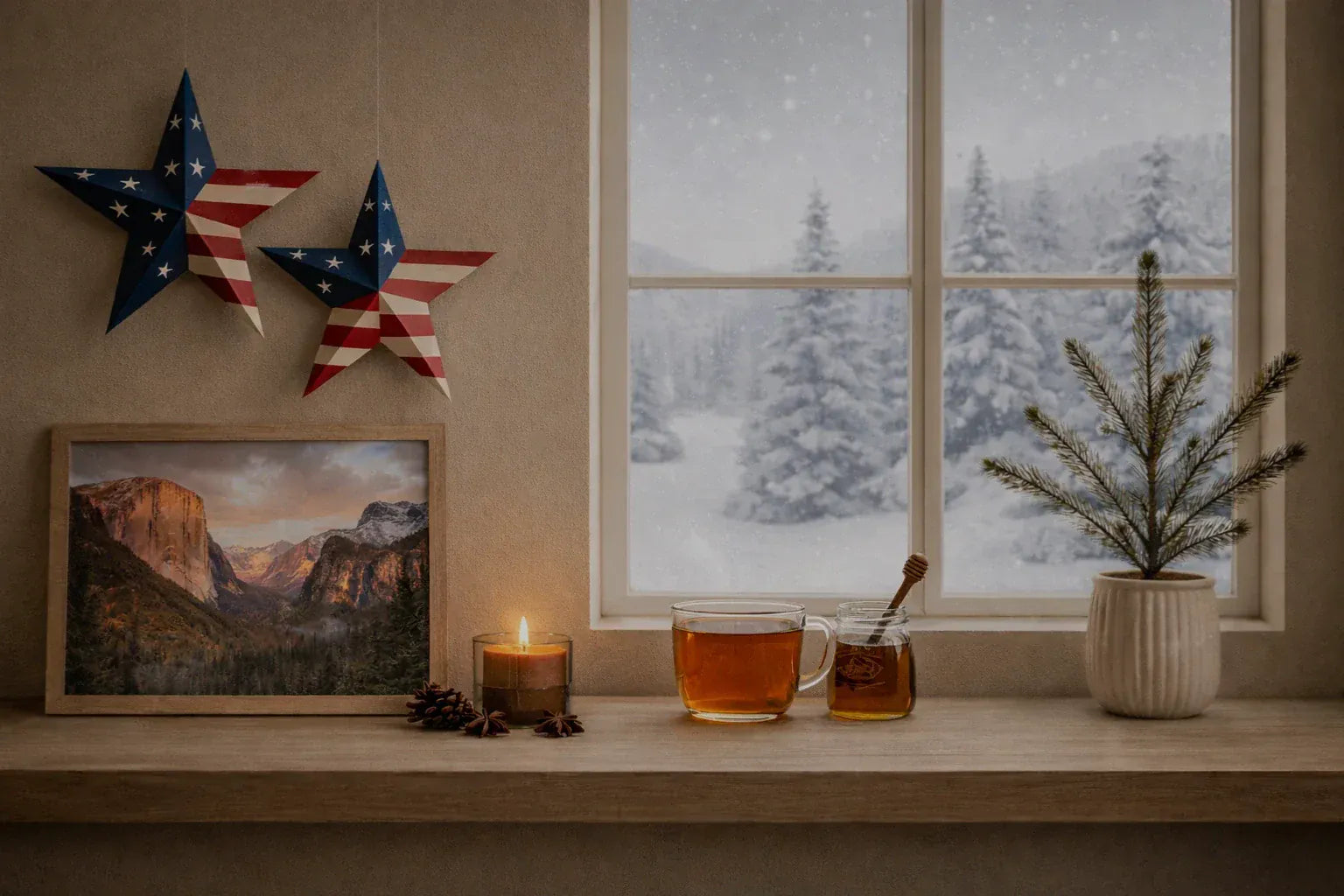 Window sill with two mugs of tea, a candle, and decorative items with a snowy landscape view outside.