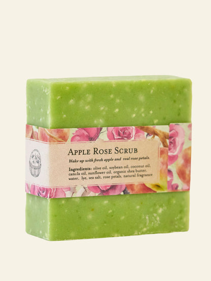 Green bar of soap with a colorful label on a white background