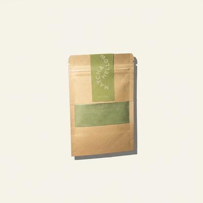 Kraft paper packaging with a green label on a white background