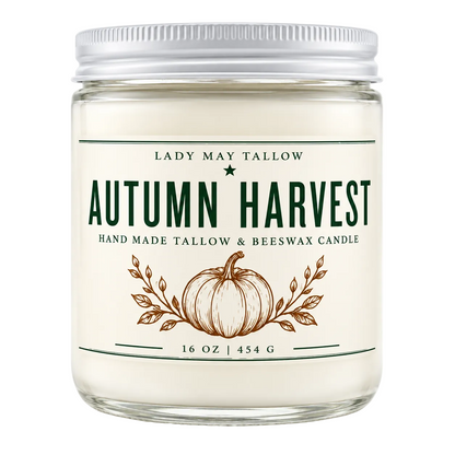 A 16 oz glass jar candle with a silver metal lid, featuring a cream-colored label with &