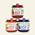 Three jars of Blake Hill Naked Fruit Spreads in strawberry, peach, and blueberry flavors on a white background.