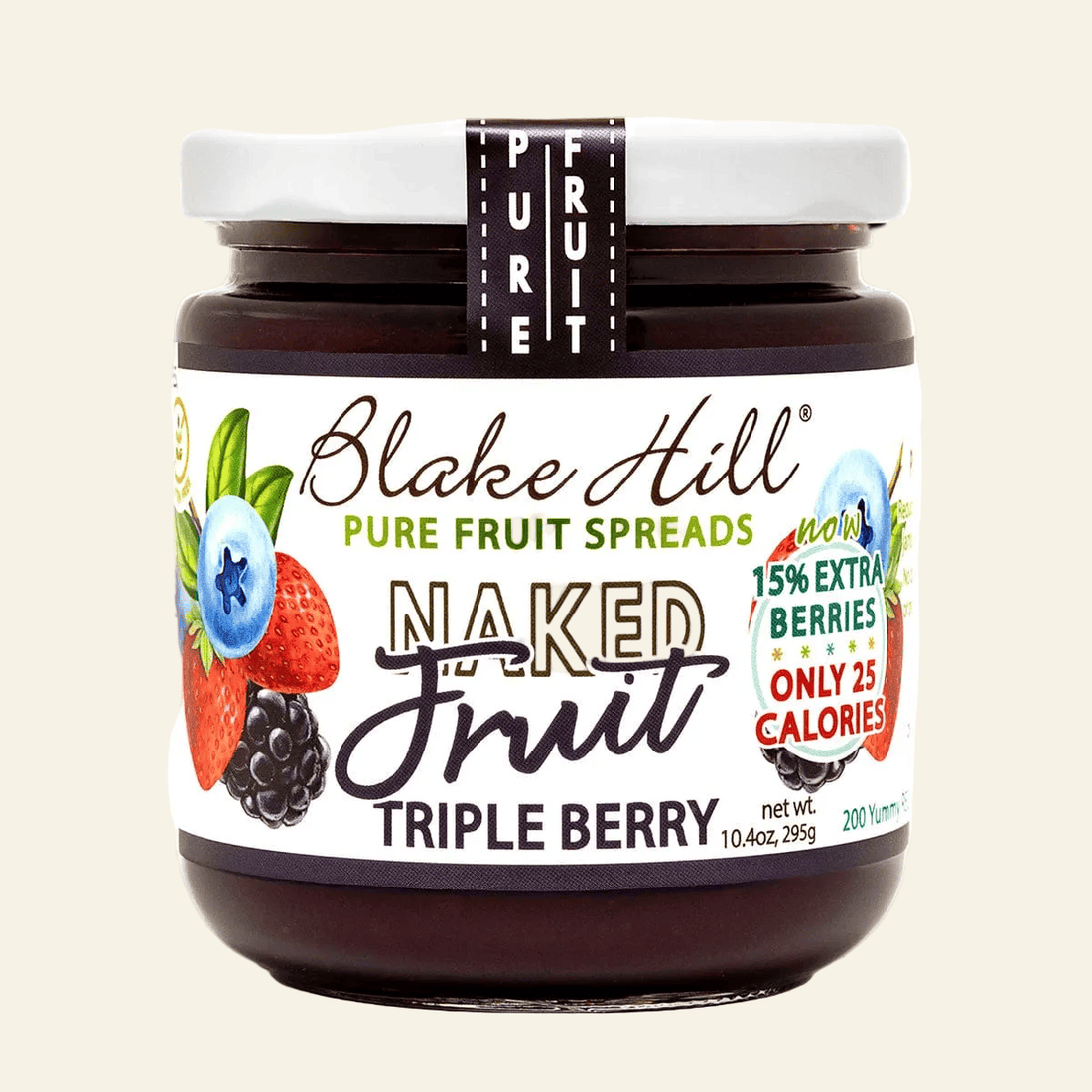 Jar of Blake Hill Naked Fruit Triple Berry spread on a white background