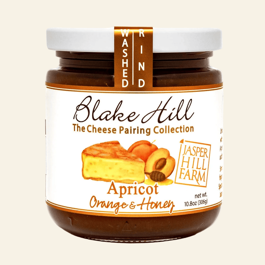 Jar of Blake Hill apricot orange honey on a white background