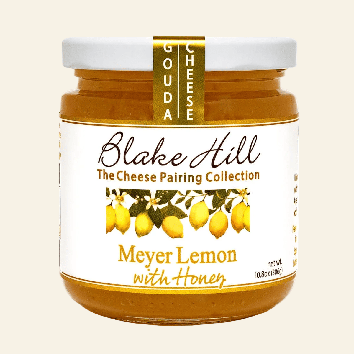Jar of Blake Hill Meyer Lemon with Honey spread on a beige background