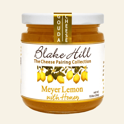 Jar of Blake Hill Meyer Lemon with Honey spread on a beige background