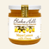 Jar of Blake Hill Meyer Lemon with Honey spread on a beige background