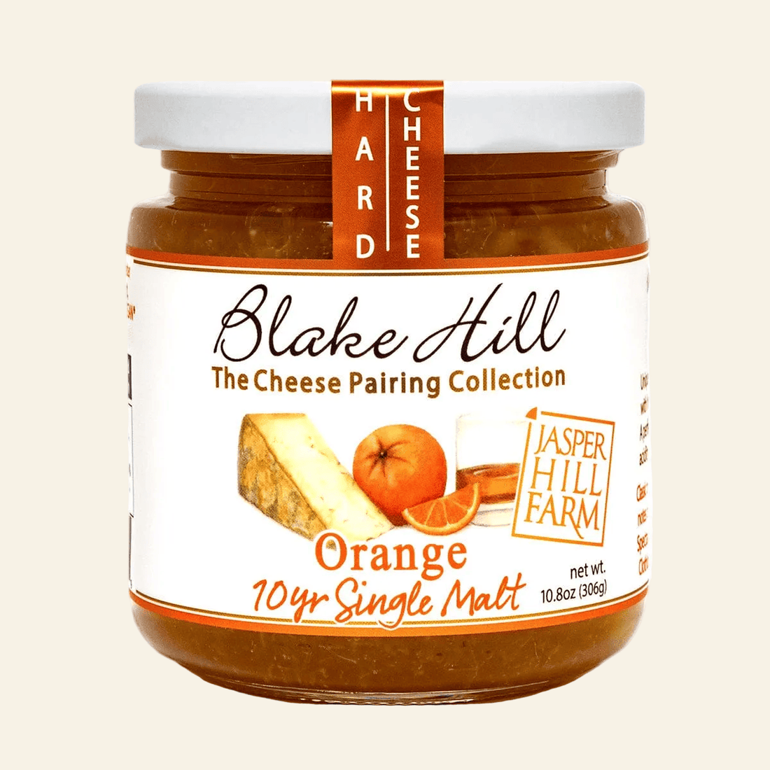 Jar of Blake Hill Hard Cheese with orange flavor on a white background