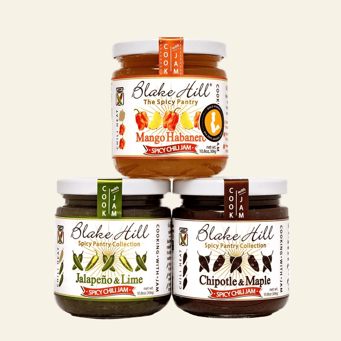 Four jars of Blake Hill spicy chili jam on a white background