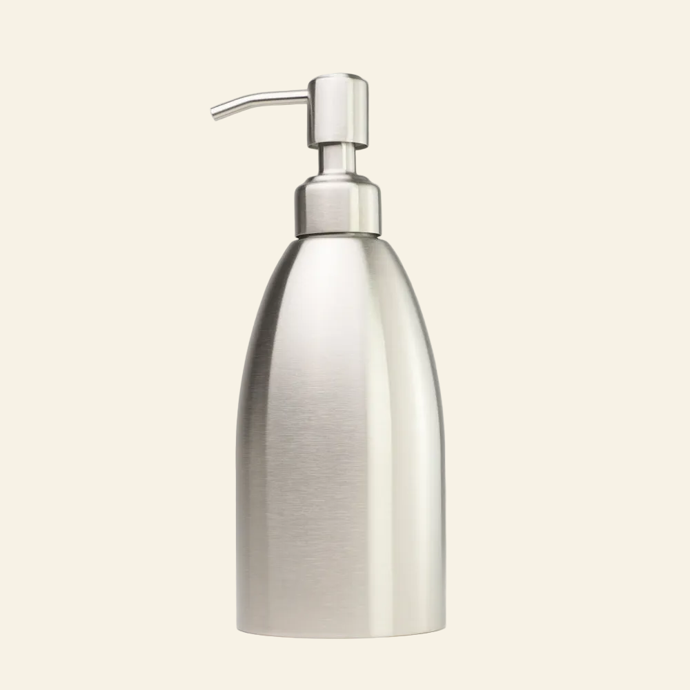 Silver soap dispenser on a light gray background