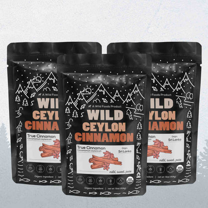Three packages of Wild Ceylon Cinnamon with black and white design on a light gray background