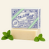 A bar of Tallow Soap from Lady May Soap & Suds, specifically Lavender Mint, displayed in its blue and white patterned packaging box with a matching cream-colored bar of soap underneath, styled with fresh mint leaves and purple lavender sprigs on a white background.