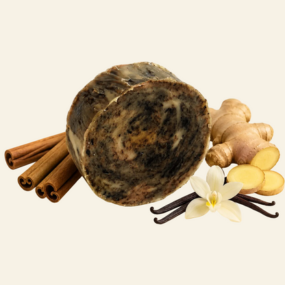 Chai soap bar with cinnamon, ginger, and vanilla ingredients displayed on a warm cream background with text reading &
