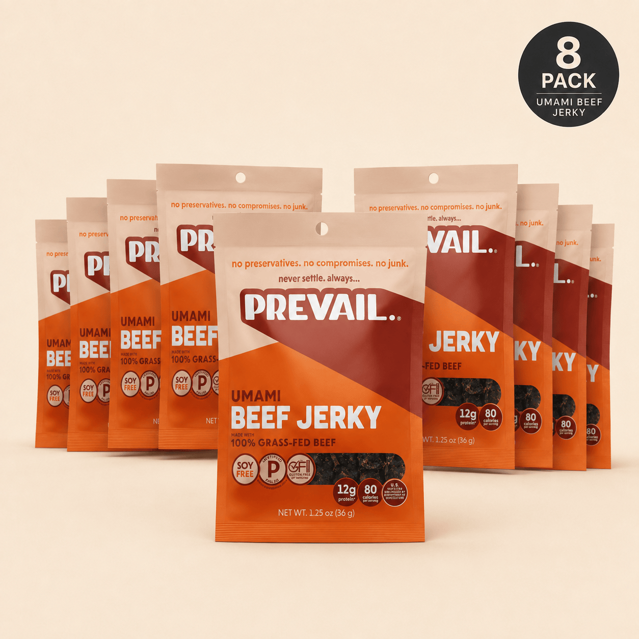 Eight packages of Prevail Umami Beef Jerky arranged in a fan shape on a light beige background, with a black circular &