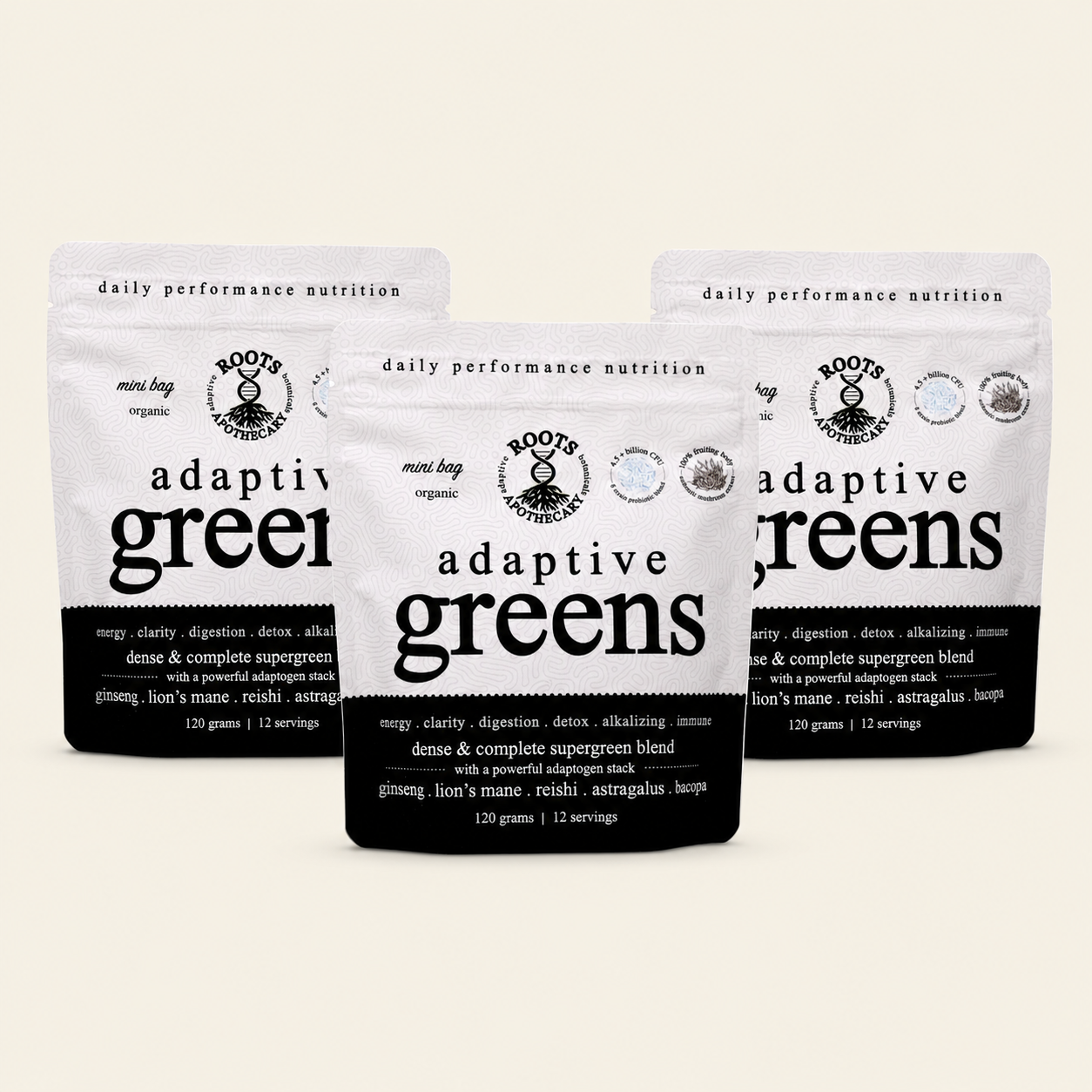 Three stand-up pouches of Boots Organic Adaptive Greens dietary supplement arranged in a fan shape against a light beige background.