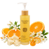Honeybee Happee bottle of California Sunshine body oil with oranges and flowers on a white background