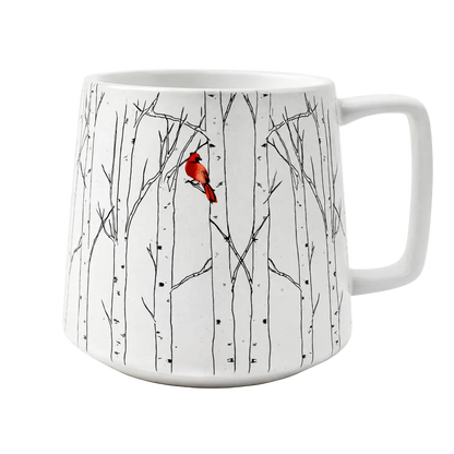 White mug with a red cardinal bird design on a white background