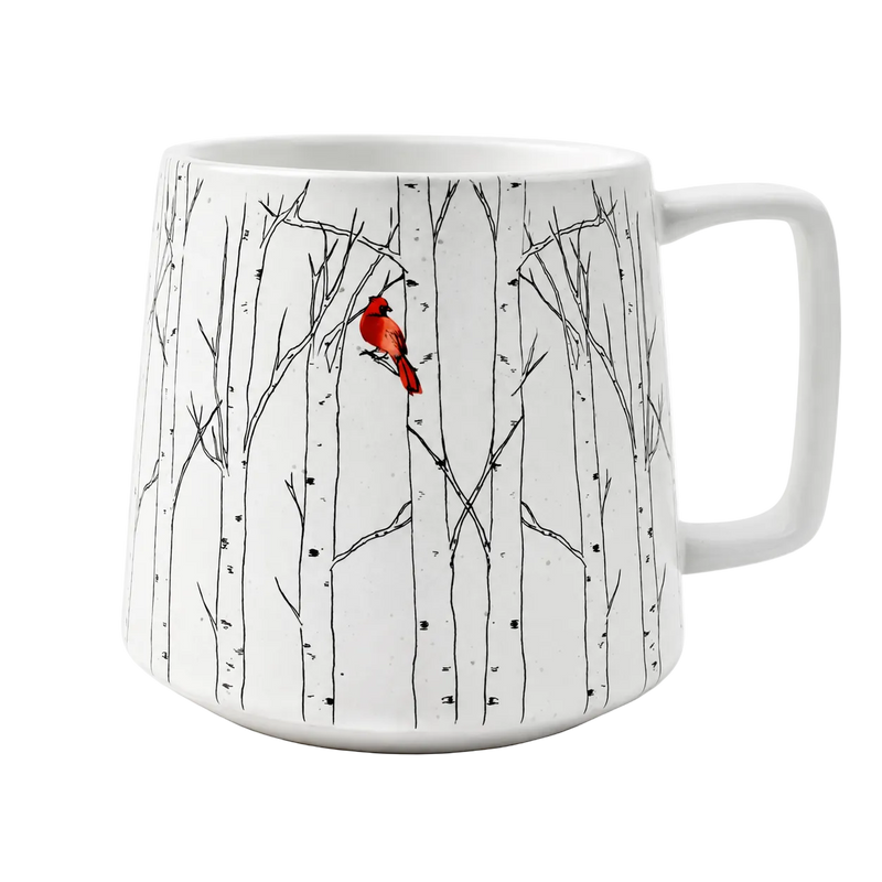 White mug with a red cardinal bird design on a white background