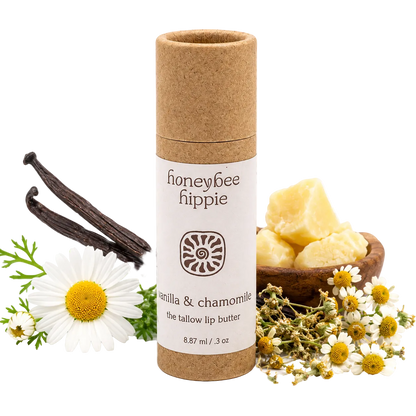 Honeybee Hippie vanilla and chamomile lip butter with vanilla beans, flowers, and beeswax on a white background