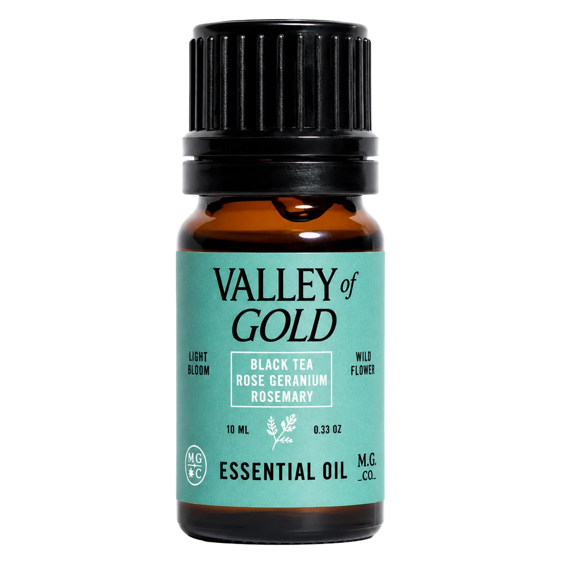 Valley of Gold essential oil bottle with black cap on a white background