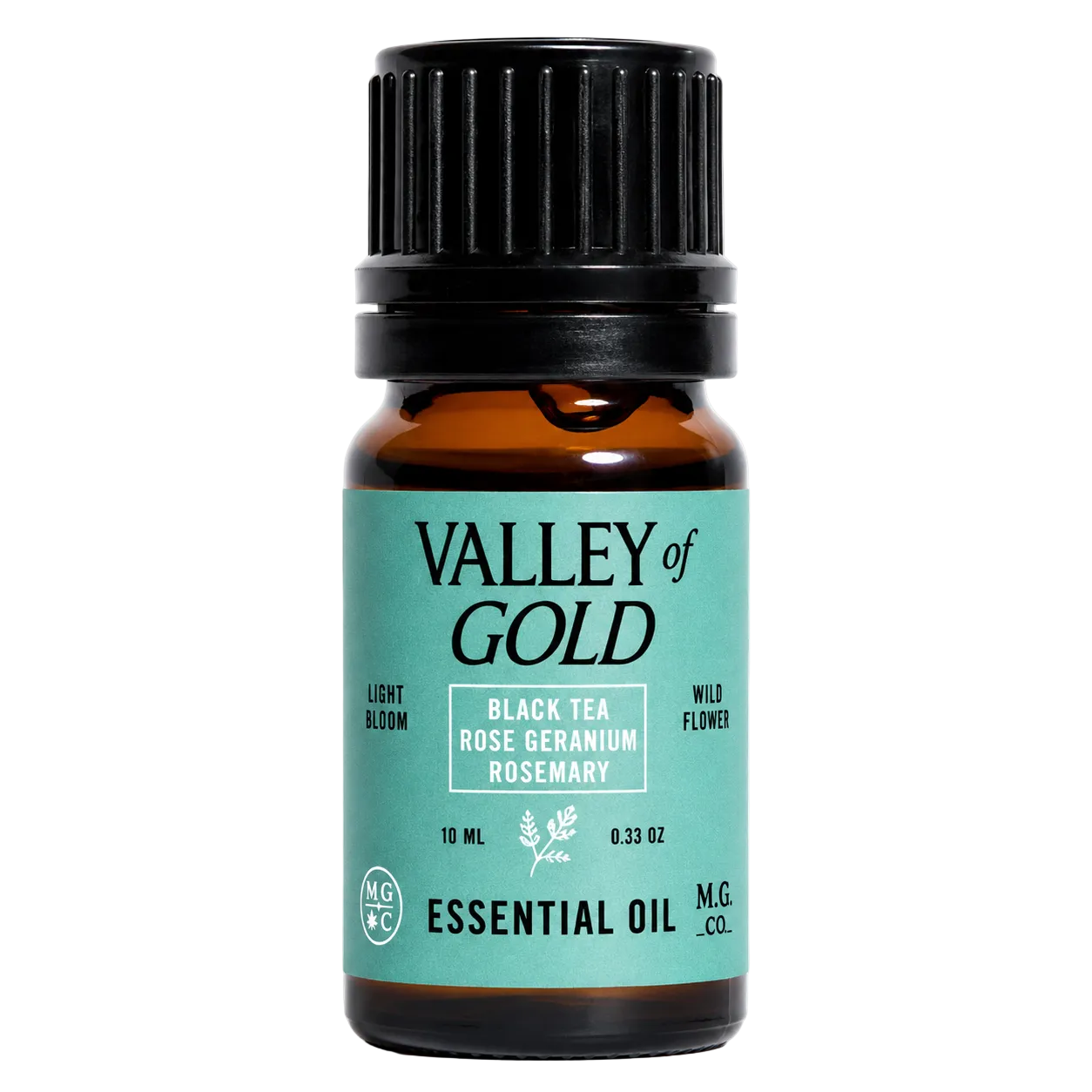 Valley of Gold essential oil bottle with black cap on a white background