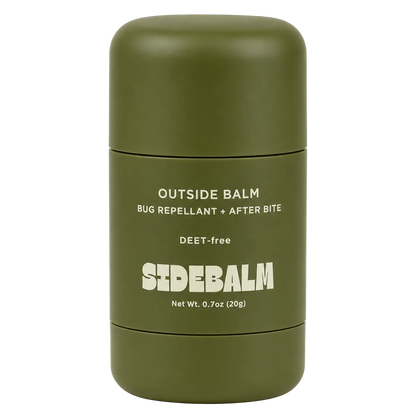 Green container of SideBalm bug repellent and after-bite balm on a white background
