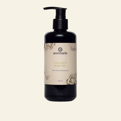 Coconut body oil bottle with a beige label on a white background