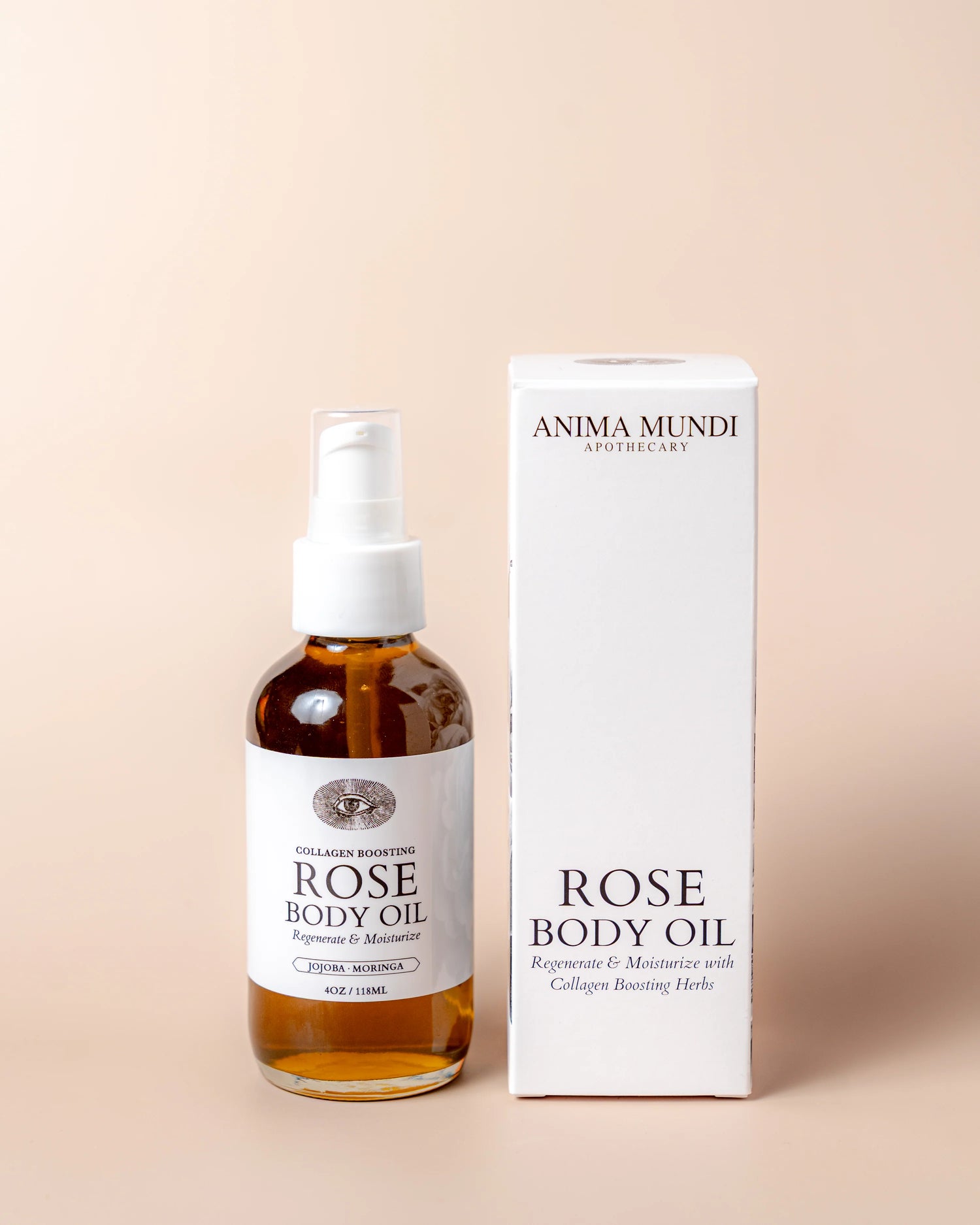 Rose body oil bottle and packaging on a beige background