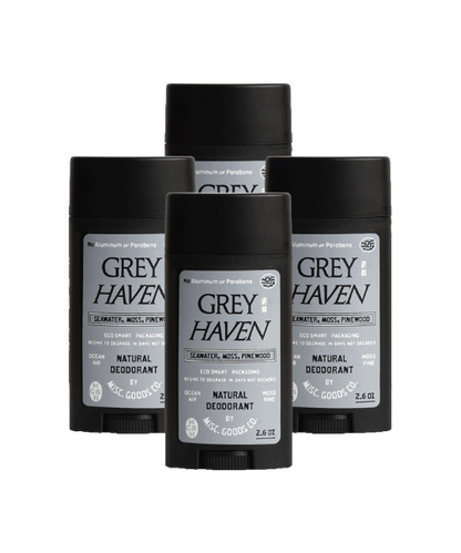 Three bottles of Grey Haven natural deodorant on a white background