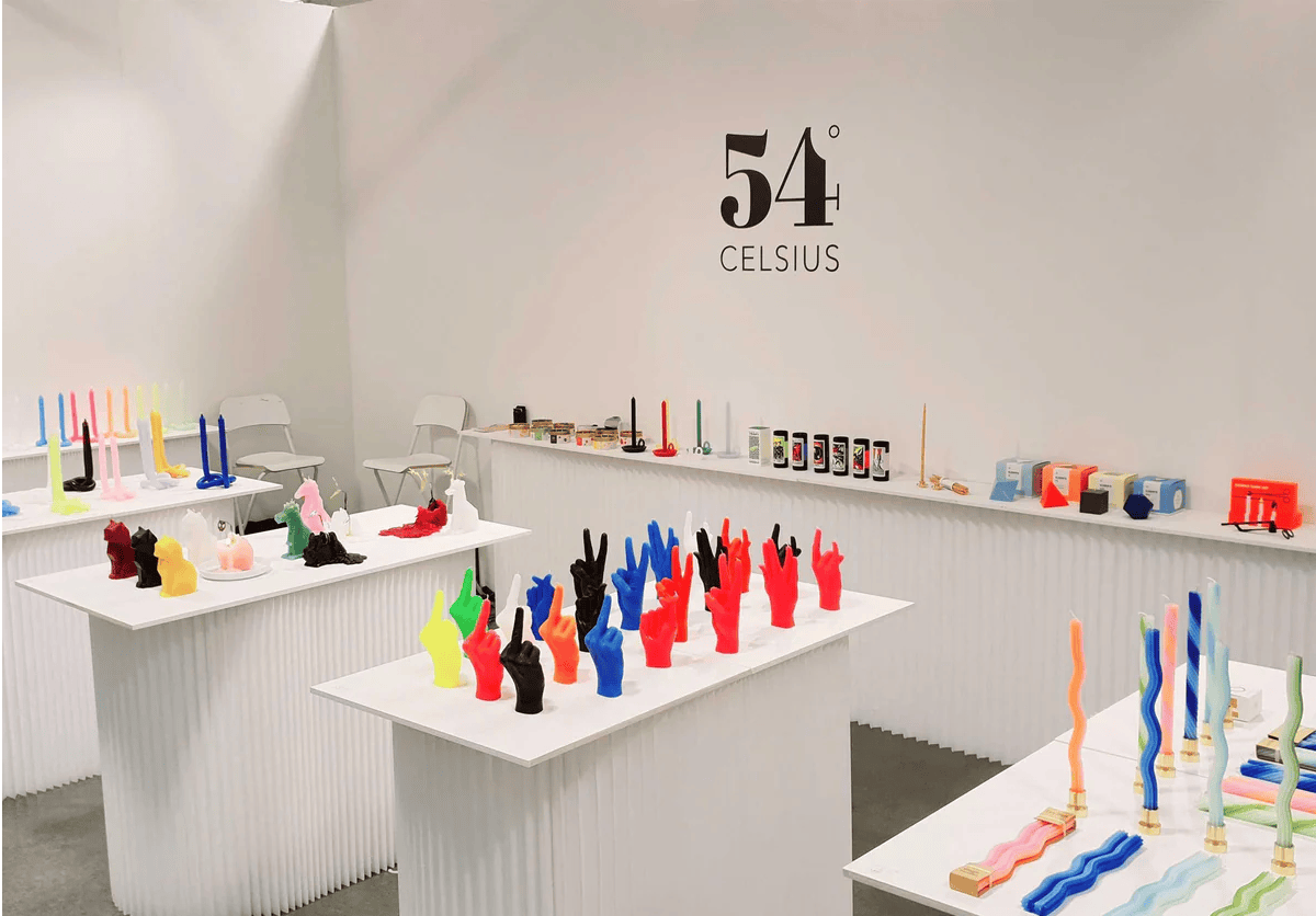 Display of colorful glass objects in a room with '54 Celsius' branding.