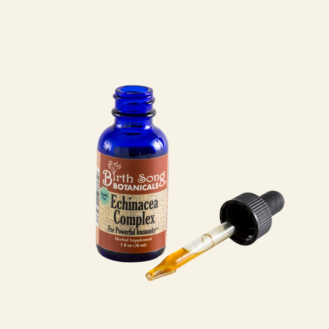 Blue glass bottle with dropper labeled &