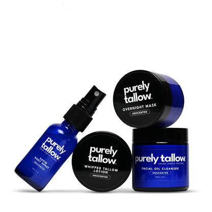 Four Purely Tallow skincare products arranged on a white background: a blue bottle of facial oil cleanser with spray, a blue jar of facial oil cleanser, a black-lidded jar of overnight mask, and a black-lidded bottle of whipped tallow lotion.
