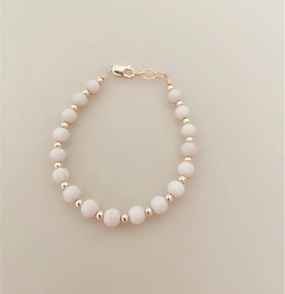 Tan &amp; gold layer bracelet