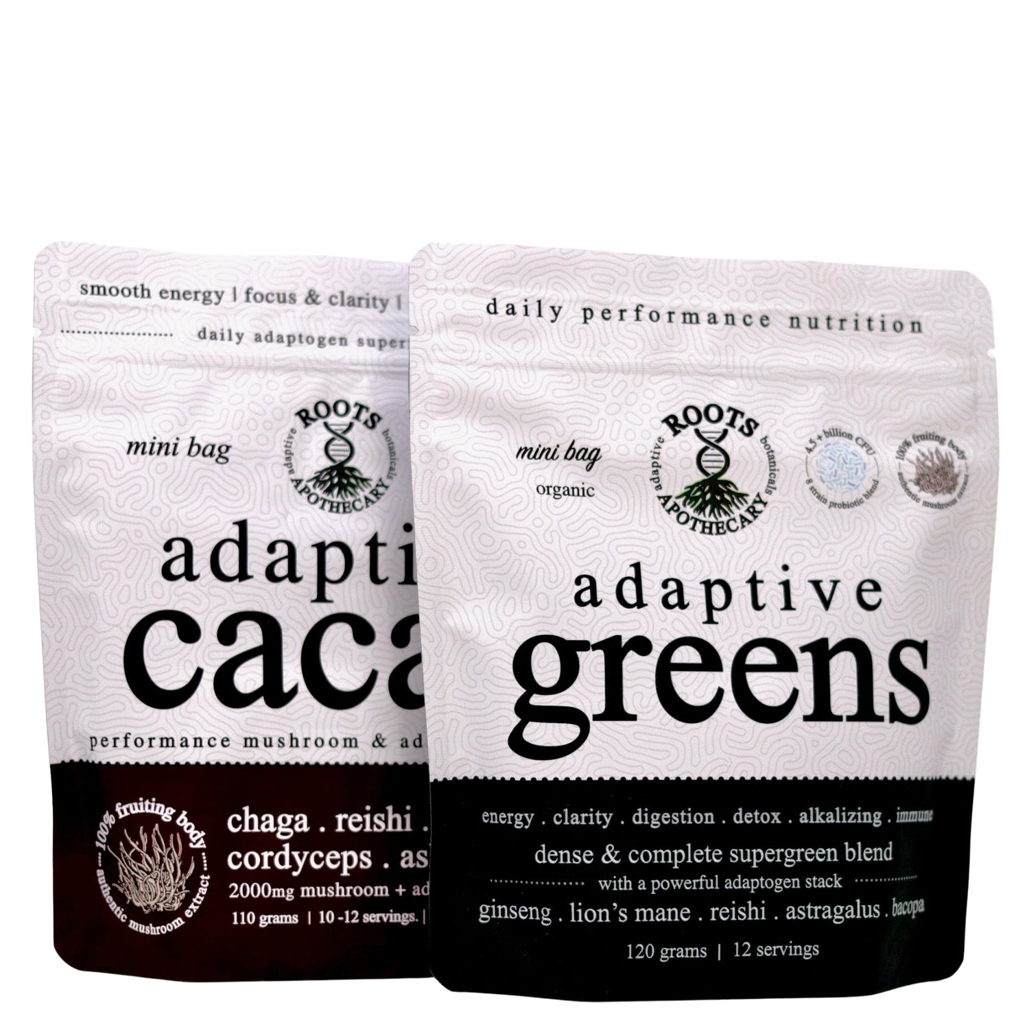 Two packages of Roots Anothecary adaptive cacao and adaptive greens on a white background