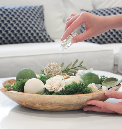 Gardens of Bali Potpourri in a wood bowl. Showing hoe to use the refresher fragrance vile.