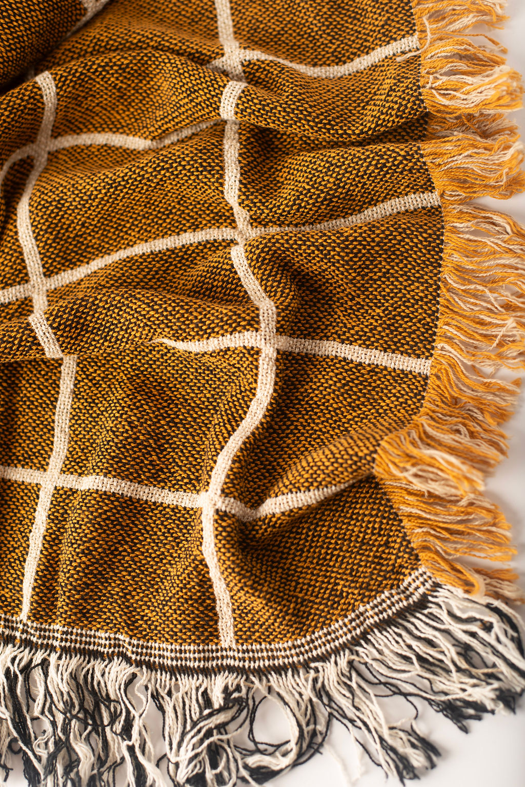 Greer Acorn Golden Brown Grid Cotton Throw Blanket