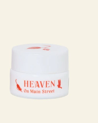 White jar with red text &