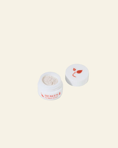 Cosmetic jar with a red flower logo on a white background