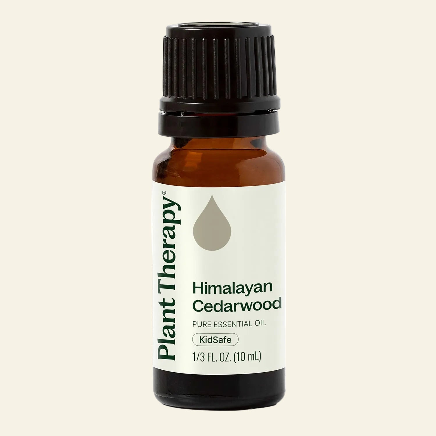Bottle of Plant Therapy Himalayan Cedarwood essential oil on a white background