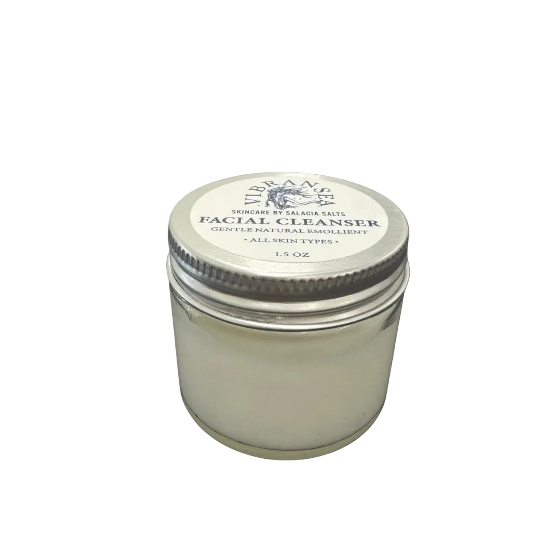 Facial cleanser jar with a metal lid on a white background